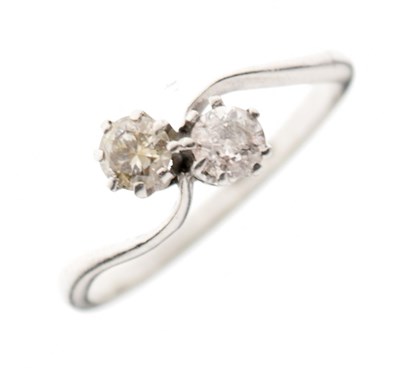 Lot 7 - Platinum and diamond two-stone crossover ring