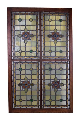 Lot 635 - Stained glass panels (4) in one frame