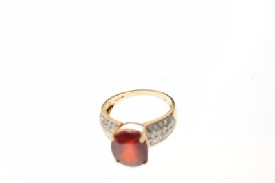 Lot 11 - 9ct gold ring set red stone and diamonds
