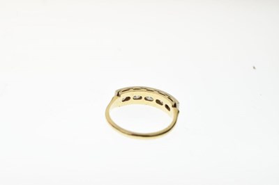 Lot 5 - Five stone diamond 18ct gold half hoop ring