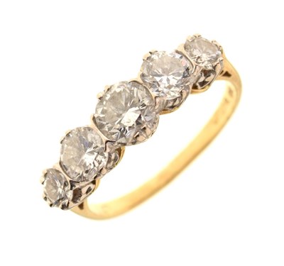 Lot 9 - Five stone diamond 18ct gold ring