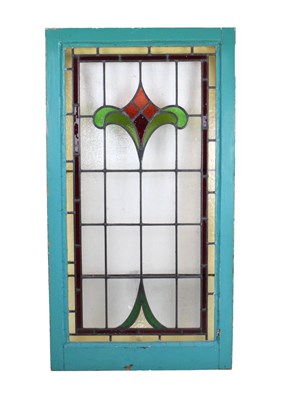 Lot 568 - Early 20th Century stained glass panel in wooden frame