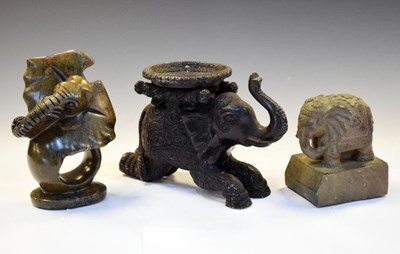 Lot 183 - Indian elephant stand and two elephant figures