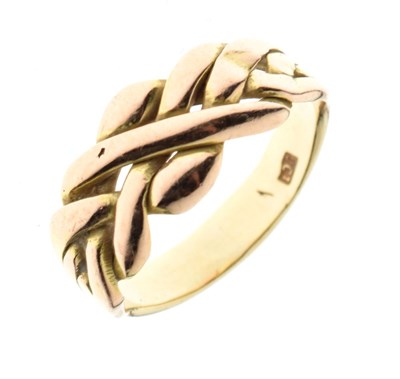 Lot 11 - Yellow metal (9ct) ring, plaited design