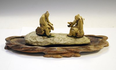 Lot 184 - Japanese pottery figure group