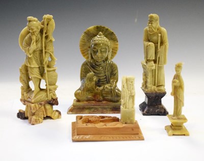 Lot 629 - Group of five East Asian carved soapstone figures