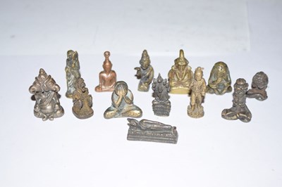 Lot 213 - Thirteen Thai and other South East Asian miniature bronzes