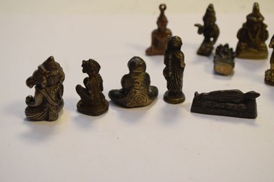 Lot 213 - Thirteen Thai and other South East Asian miniature bronzes
