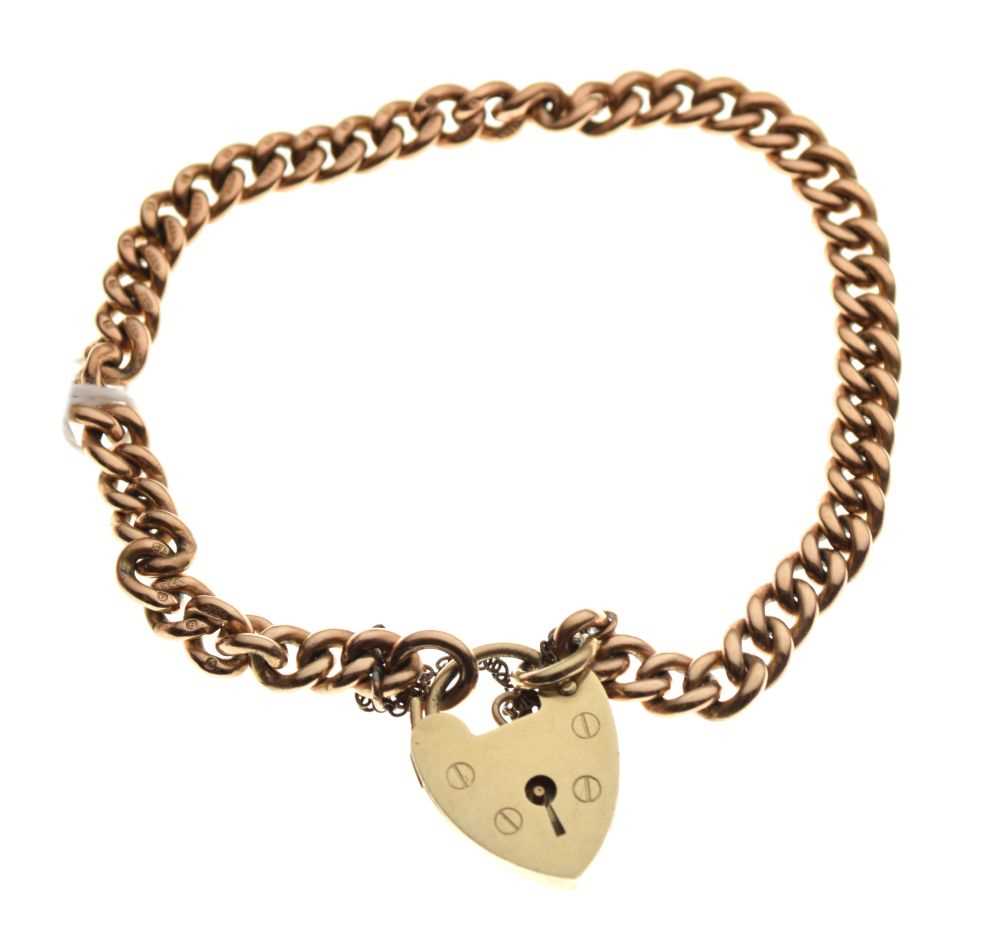Lot 38 - 9ct gold curb-link bracelet with 9ct gold heart-shaped padlock