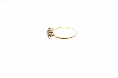 Lot 4 - Yellow metal, sapphire and diamond three-stone ring