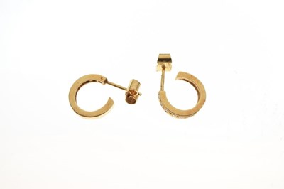 Lot 59 - Pair of 18ct gold diamond set hoop earrings