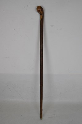 Lot 206 - Four various walking sticks - Dog's head, two clasped hands, etc (4)