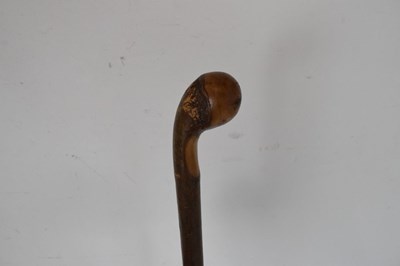 Lot 206 - Four various walking sticks - Dog's head, two clasped hands, etc (4)