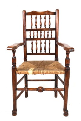 Lot 539 - Two rush-seated spindle-back chairs with rush seats