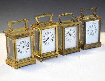 Lot 397 - Four assorted brass cased carriage clocks