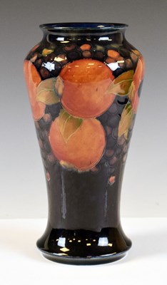 Lot 348 - William Moorcroft 'Pomegranate and Berry' pattern vase