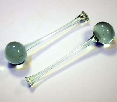 Lot 333 - Pair of Nailsea type pale green glass 'drumstick' witches charms