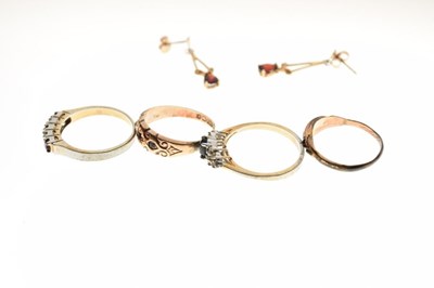 Lot 27 - 9ct gold gypsy set ring, three dress rings, and a pair of 9ct gold drop earrings