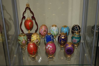 Lot 345 - Collection of twelve House of Faberge collectors eggs, etc