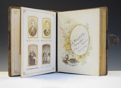 Lot 129 - Victorian album of studio photographs including Penny farthing bicycle interest