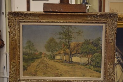 Lot 407 - Joseph Theodore Coosemans (1828-1904) - Oil on canvas - Country road with figures