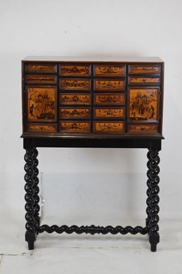 Lot 561 - South German marquetry cabinet on stand