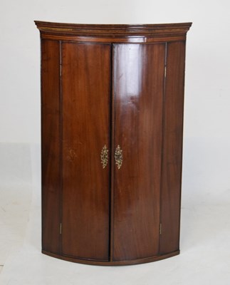 Lot 725 - Georgian bow fronted wall cupboard