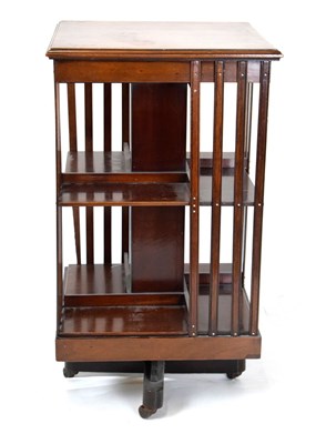 Lot 470 - Edwardian inlaid revolving bookcase