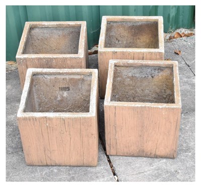 Lot 670 - Set of four square 'stoneware' log effect garden planters