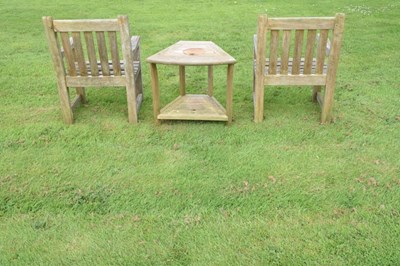Lot 657 - Woodfurn three-piece teak garden set