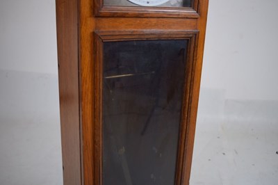 Lot 516 - Mid 20th Century oak-cased electric clock