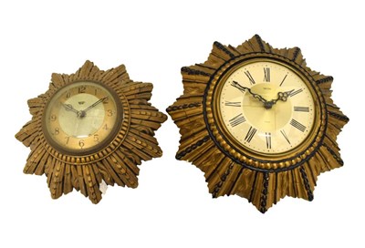 Lot 384 - Two Smiths plaster star-burst wall clocks