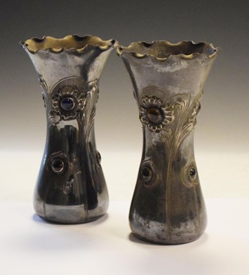 Lot 215 - Pair of Art Nouveau silver plated vases with stylised floral decoration