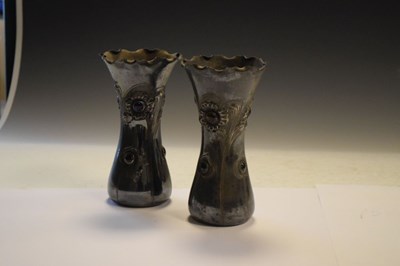 Lot 215 - Pair of Art Nouveau silver plated vases with stylised floral decoration
