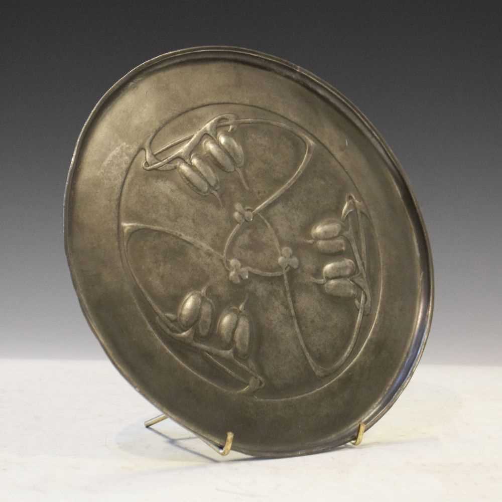 Lot 305 - Tudric pewter circular tray after a design by Archibald Knox