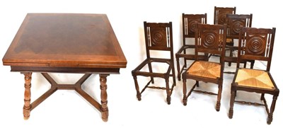 Lot 584 - Mid 20th Century oak draw leaf dining table, together with six dining chairs