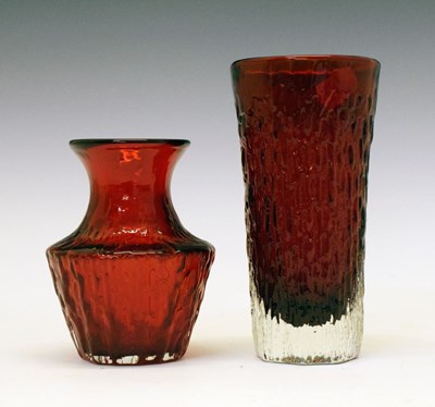 Lot 424 - Whitefriars - 1970s 'Pot Belly' and 'Beaker' vases in ruby glass