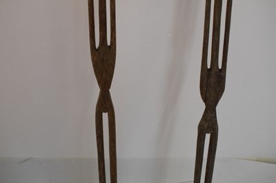 Lot 227 - Ethnographica - Pair of tall African Nyamwezi carved 'stick' figures