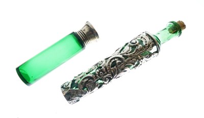Lot 162 - Edward VII silver-mounted green glass bottle, together with a similar silver capped bottle