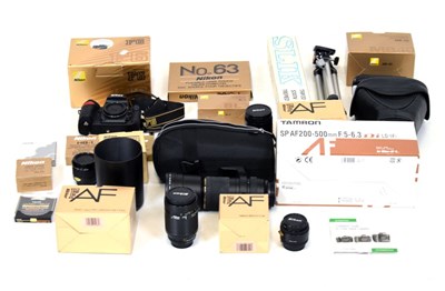 Lot 378 - Nikon F6 SLR camera, TC200 lens and accessories