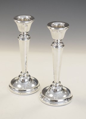 Lot 194 - Pair of Elizabeth II silver candlesticks of tapered form