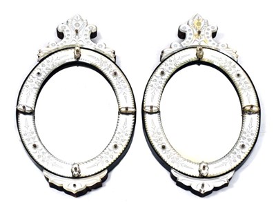 Lot 524 - Pair of Italian (Florentine) oval wall mirrors c.1900