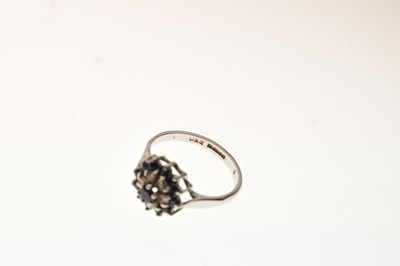 Lot 8 - 18ct white gold, sapphire and diamond cluster ring
