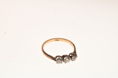 Lot 3 - Yellow metal, three stone diamond ring, stamped '18ct'