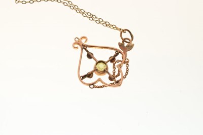 Lot 56 - 9ct gold peridot ring, and similar pendant on chain