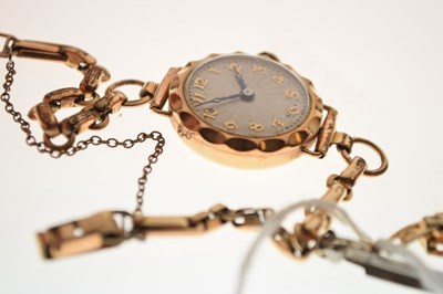 Lot 116 - Two ladies gold watches with plated bracelets