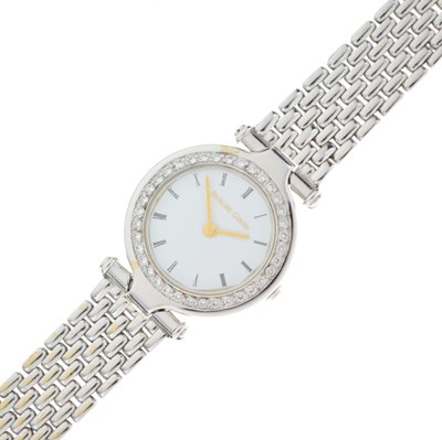 Lot 56 - Bueche Girod - Ladys' 9ct white gold, diamond set bracelet watch