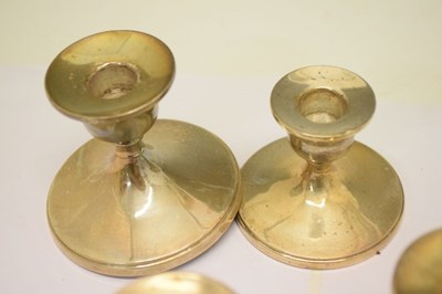 Lot 142 - Set of four George VI silver table candlesticks