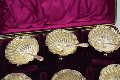 Lot 136 - Cased set of six Victorian silver shell salts with original spoons