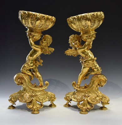 Lot 601 - Pair of gilt metal centrepieces of winged cherubs